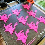 Freshly printed 3D figures from the 3D printer.