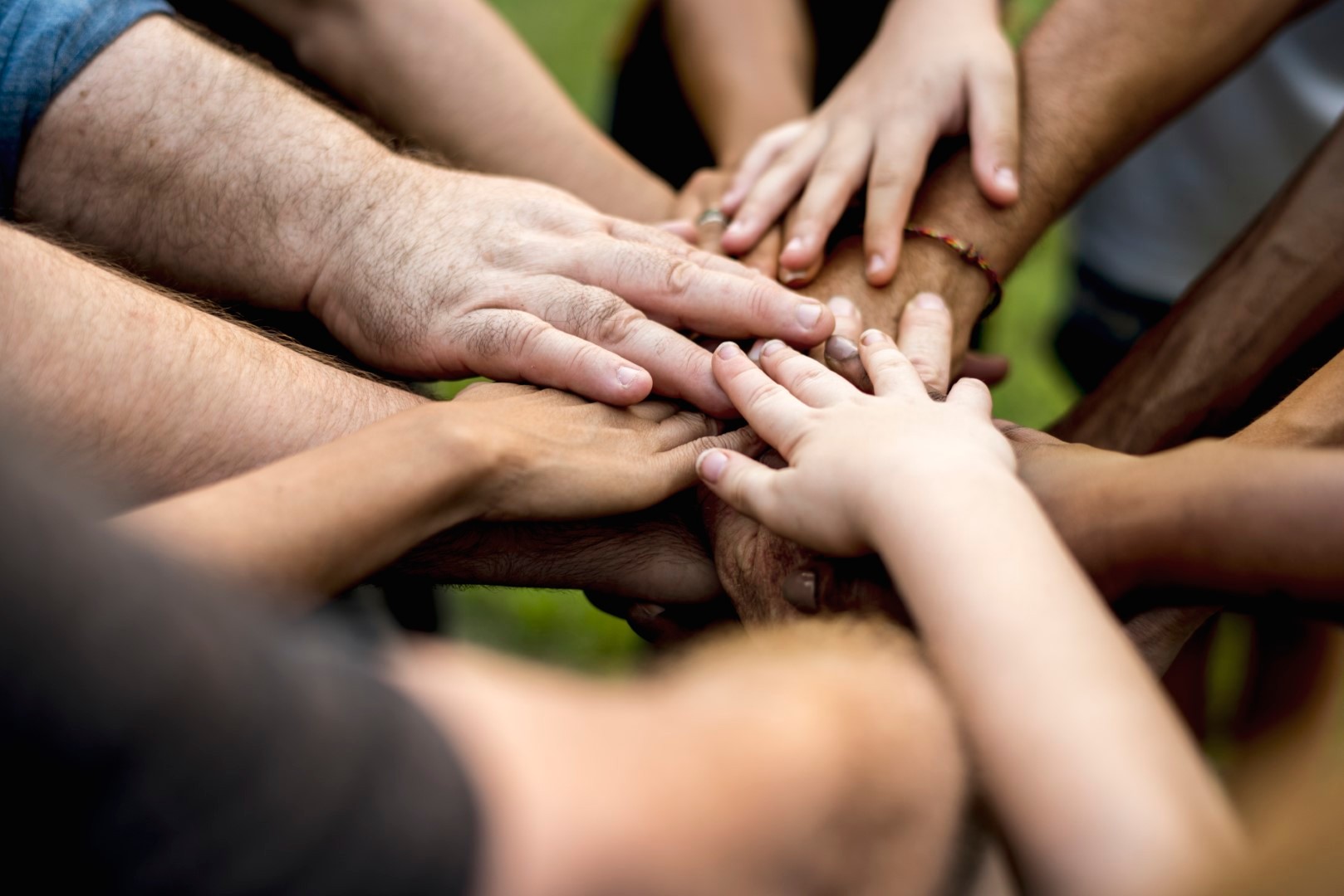 Group of diversity people hands stack support together