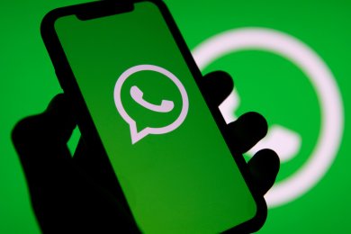LONDON, UK - March 2021: Whatsapp online messaging service logo on a smartphone LONDON, UK - March 2021: Whatsapp online messaging service logo on a smartphone